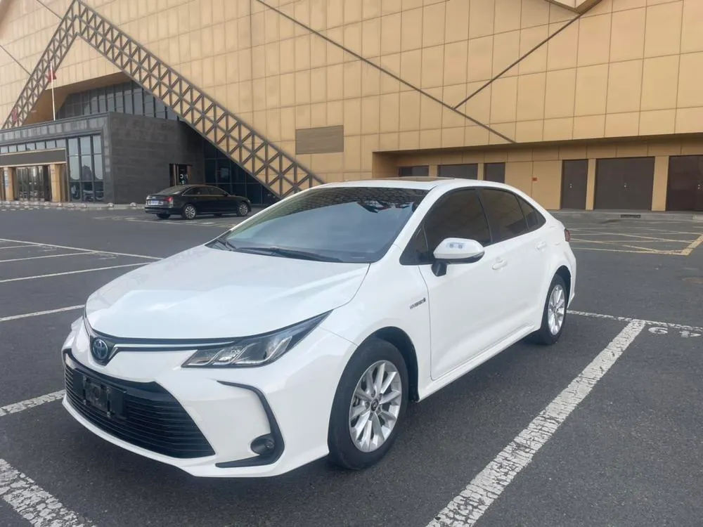 Toyota Corolla Dual Engine 1.8L E-CVT Elite Edition, 2021 — фото 1