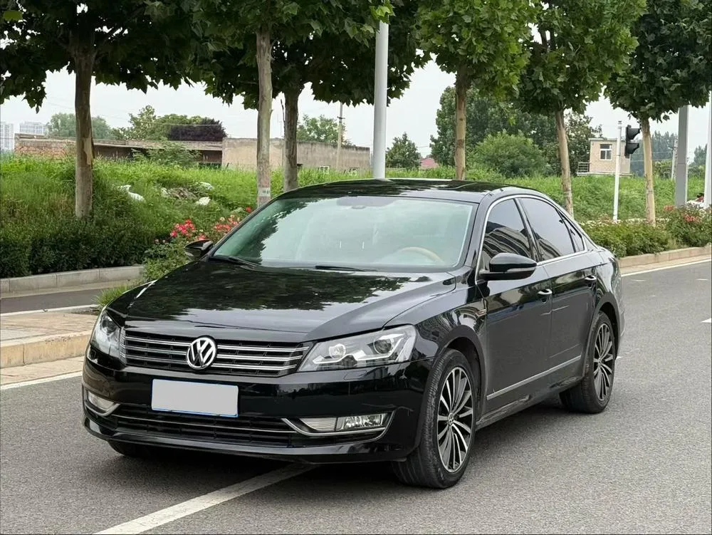 Volkswagen Passat 1.8TSI DSG Premium Navigation Edition, 2014 — фото 1