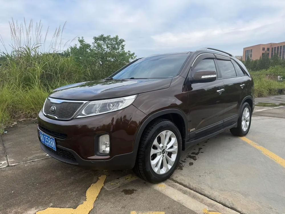 Kia Sorento 2.4L 7 мест бензин высшая UVO версия, 2013 — фото 1